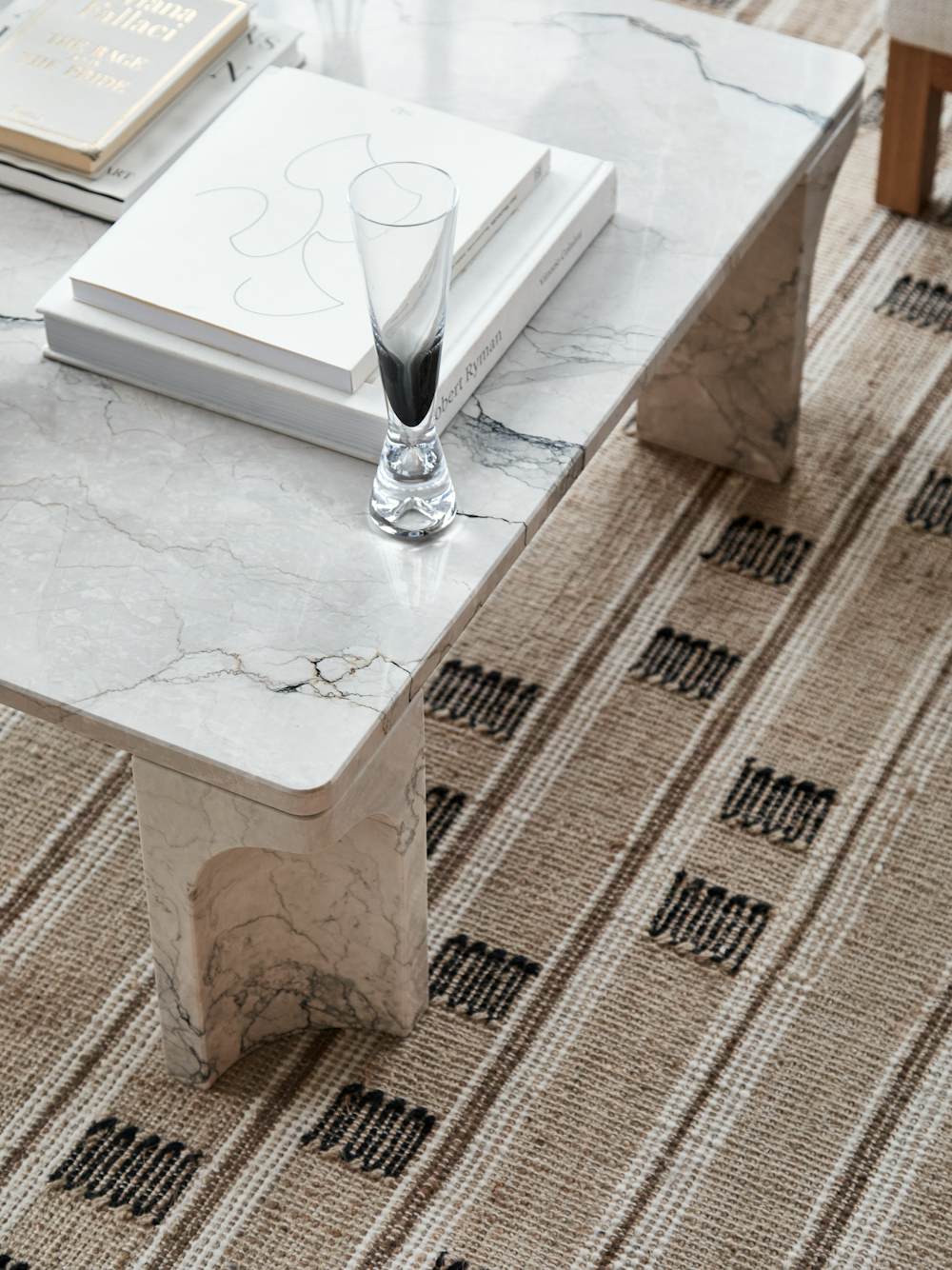 Doric Table, Koodi Flatweave Jute Rug and Tank Champagne Glasses